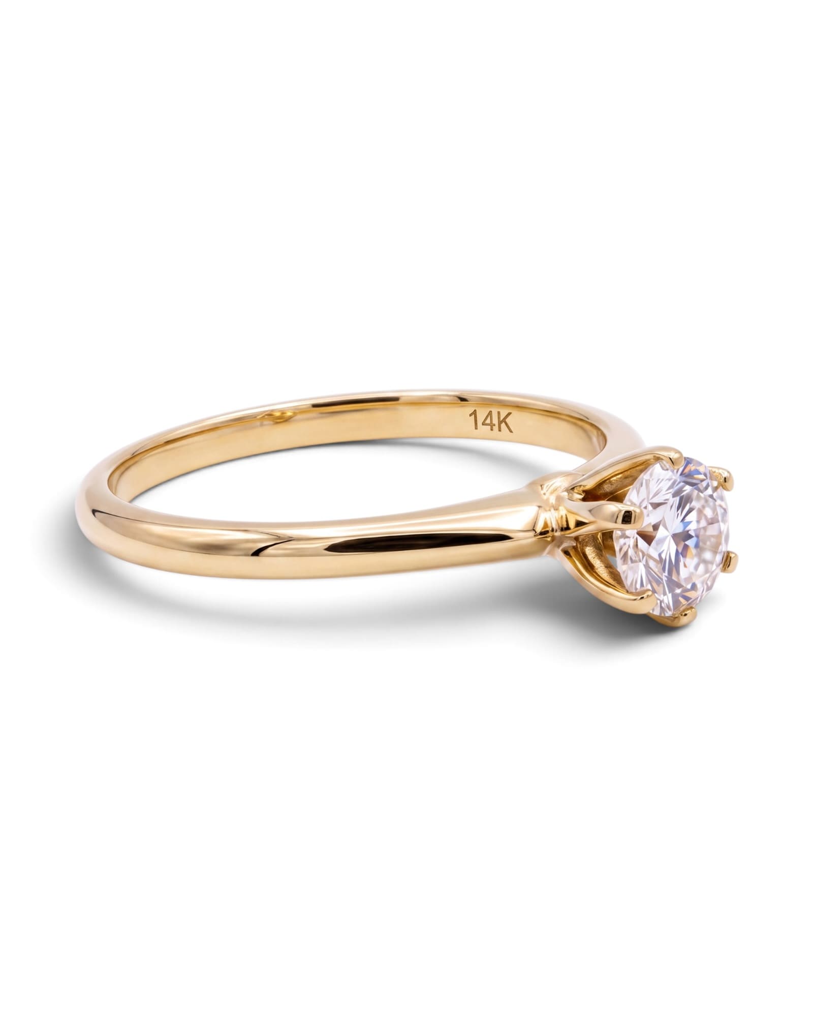 Anillo solitario con Diamante natural 0.30 CT en Oro amarillo 14k