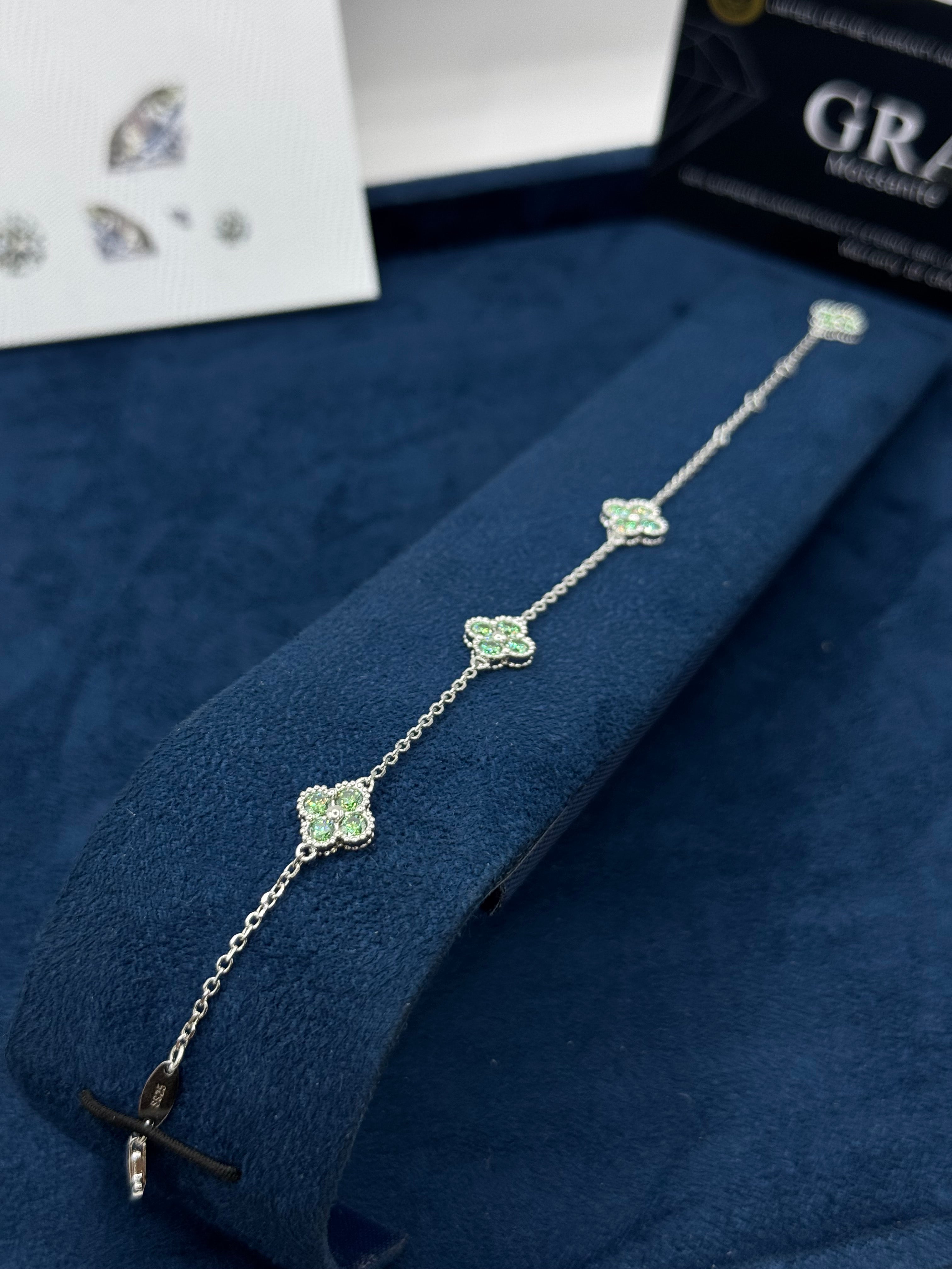 Green moissanite clover set