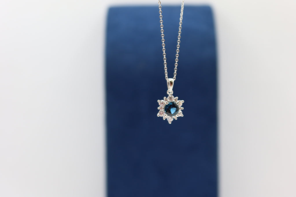 Dije flor azul