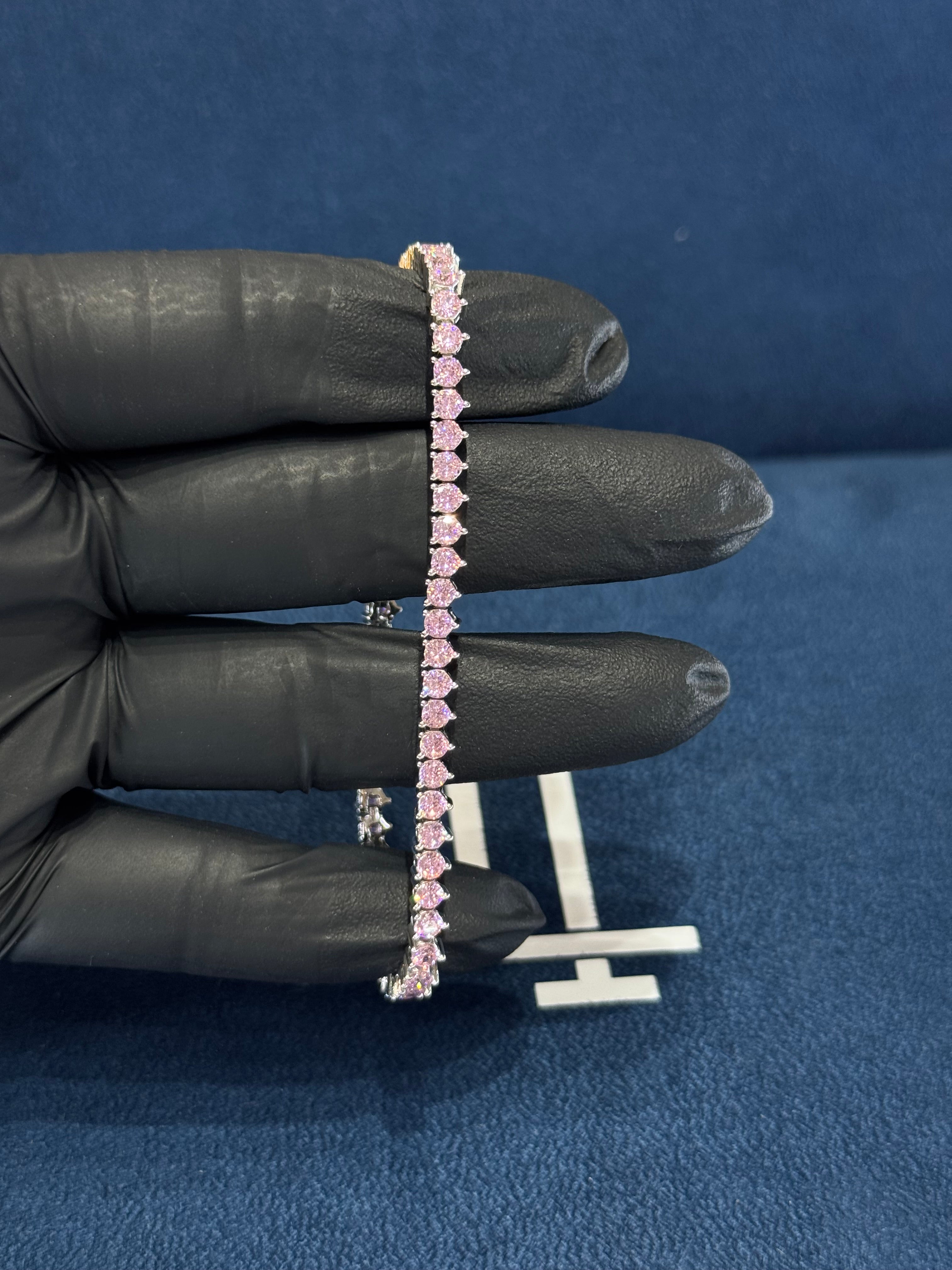 Pulso tenis rosa 3 uñas